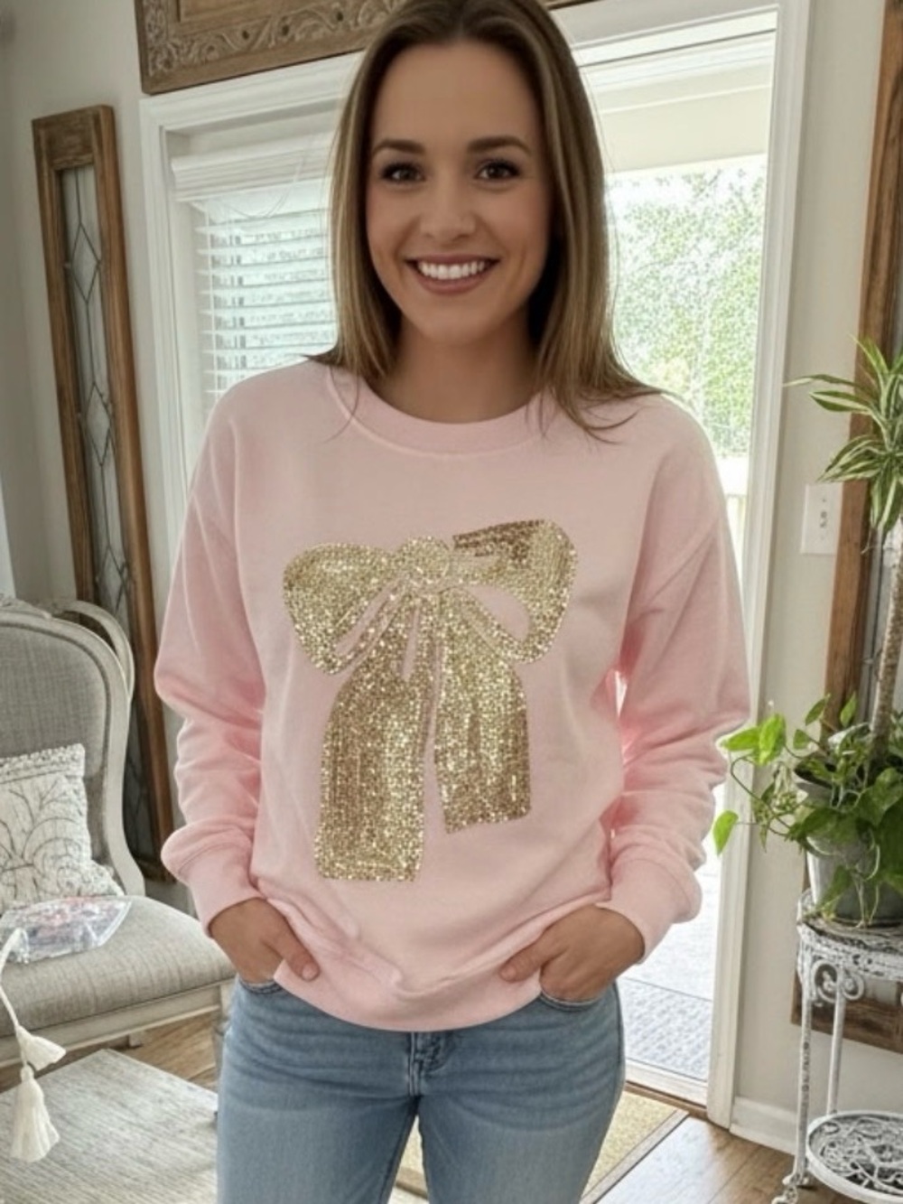 The softest pink knit  Sweatshirt with Gold Sequin Bow. Fun! Never worn.